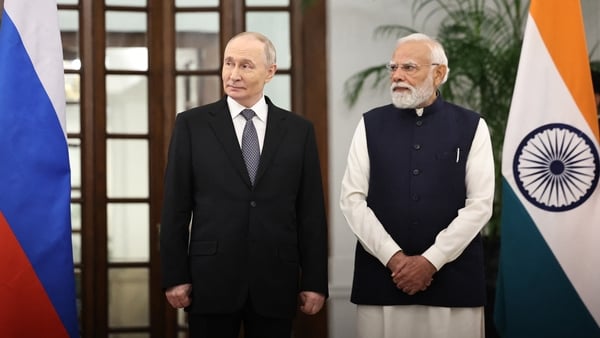 In this pool photograph distributed by the Russian state agency Sputnik, Russia's President Vladimir Putin and India's Prime Minister Narendra Modi are seen after their talks at the Hyderabad House in New Delhi on December 5, 2025. (Photo by Alexander KAZ