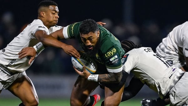 29 November 2025; Bundee Aki of Connacht is tackled by Grant Williams, left, and Jurenzo Julius of Hollywoodbets Sharks during the United Rugby Championship match between Connacht and Hollywoodbets Sharks at Dexcom Stadium in Galway. Photo by Tyler Miller