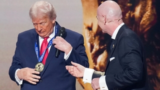 U.S. President Donald Trump receives the FIFA Peace Prize from FIFA President Gianni Infantino (R) for the FIFA World Cup 2026 Official Draw at the John F. Kennedy Center for the Performing Arts December 05, 2025 in Washington, DC. The 2026 FIFA World Cup