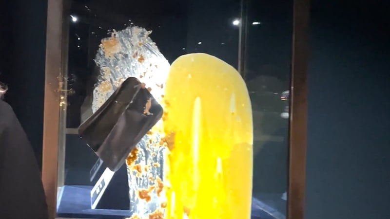 Footage released by the protest group showed protesters throwing the dessert at the protective screen encasing the jewels (Photo: Take Back Power on X)
