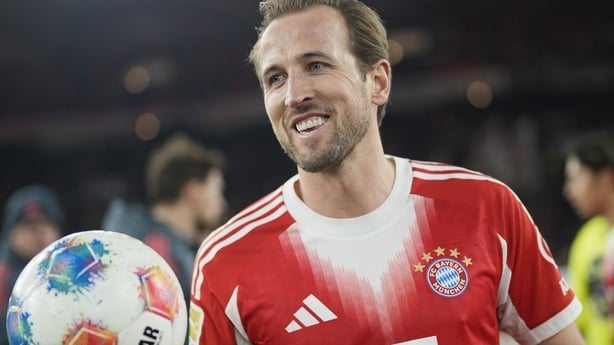 STUTTGART, GERMANY - DECEMBER 06: Harry Kane of FC Bayern Munich poses for a photograph with the match ball after scoring a hat-trick during the Bundesliga match between VfB Stuttgart and FC Bayern München at MHPArena on December 06, 2025 in Stuttgart, Germany. (Photo by F. Noever/FC Bayern via Gett