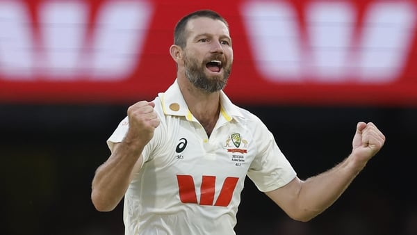 BRISBANE, AUSTRALIA - DECEMBER 07: Michael Neser of Australia celebrates the wicket of Brydon Carse of England during day four of the Second 2025/26 Ashes Series Test Match between Australia and England at The Gabba on December 07, 2025 in Brisbane, Austr