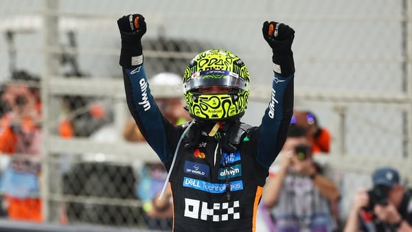 ABU DHABI, UNITED ARAB EMIRATES - DECEMBER 07: 2025 F1 World Drivers Champion and Third placed Lando Norris of Great Britain and McLaren celebrates on his car during the F1 Grand Prix of Abu Dhabi at Yas Marina Circuit on December 07, 2025 in Abu Dhabi, U