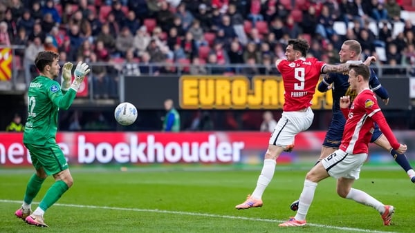 Troy Parrott of AZ Alkmaar shoots at goal during the Dutch Eredivisie match between AZ Alkmaar and Go Ahead Eagles at AFAS Stadion on December 7, 2025 in Alkmaar, Netherlands.