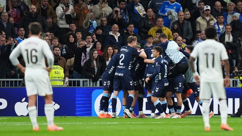 Williot Swedberg is mobbed after scoring Celta Vigo's second goal