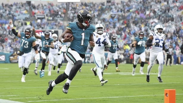 Travis Etienne Jr. #1 of the Jacksonville Jaguars runs the ball for a touchdown during the second quarter of an NFL 2025 game against the Indianapolis Colts at Everbank Stadium on December 7, 2025 in Jacksonville