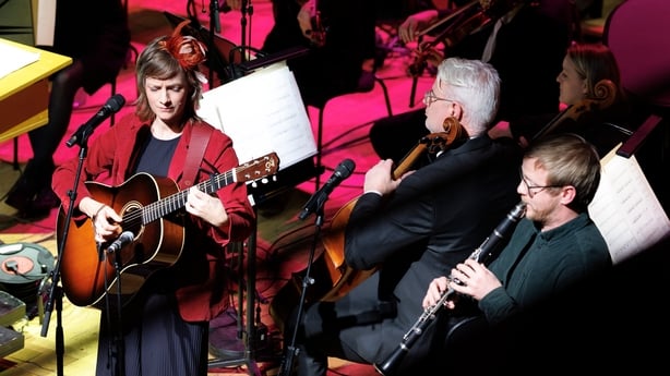musicians Naomi Berrill and Matthew Berrill perform on stage with RTÉ Concert Orchestra, at Sunday Miscellany Christmas concert, National Concert Hall, Dec 2025