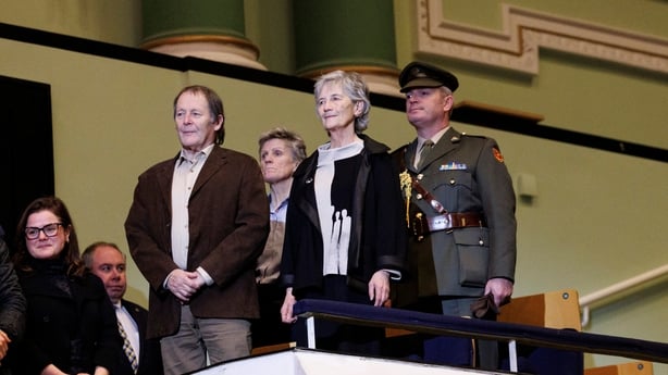 President Connolly, husband and aide de comps standing for National Anthem, in balcony of the National Concert Hall at Sunday Miscellany Christmas concert, 2025