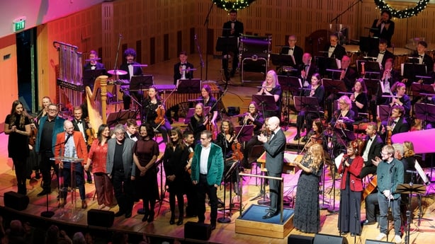 writers and musicians on stage for their final bow, at Sunday Miscellany Christmas concert, National Concert Hall, Dec 2025
