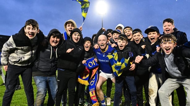 20 January 2024; Barry O'Farrell of Longford celebrates with supporters after his side's victory in the Dioralyte O'Byrne Cup final match between Dublin and Longford at Laois Hire O'Moore Park in Portlaoise, Laois. Photo by Piaras Ó Mídheach/Sportsfile