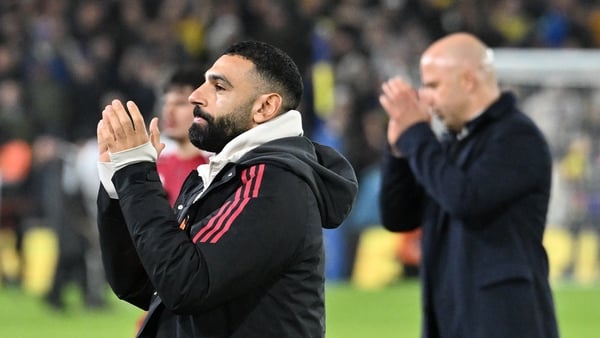 LEEDS, ENGLAND - DECEMBER 06: (THE SUN OUT, THE SUN ON SUNDAY OUT) Mohamed Salah of Liverpool looks dejected as he walks off the pitch after the final whistle alongside Liverpool Manager, Arne Slot following his team's draw in the Premier League match bet