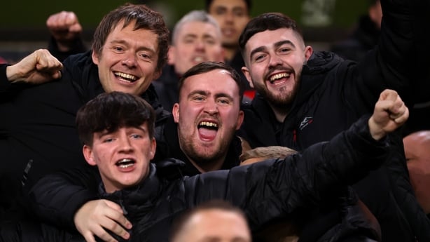 WOLVERHAMPTON, ENGLAND - DECEMBER 08: Luke Littler celebrates Manchester United's victory in the Premier League match between Wolverhampton Wanderers and Manchester United at Molineux on December 08, 2025 in Wolverhampton, England. (Photo by Alex Pantling/Getty Images)
