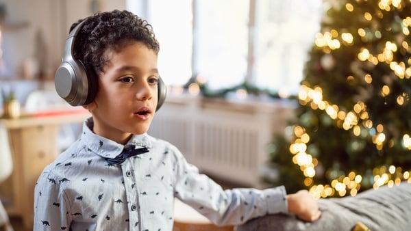 boy wearing headphones at Christmas