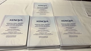 final kenova report documents on a table