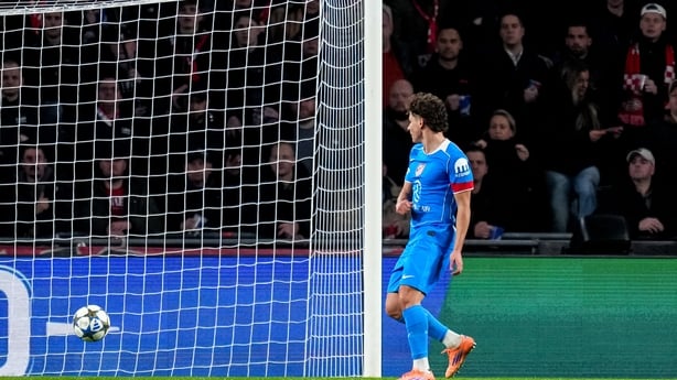 EINDHOVEN, NETHERLANDS - DECEMBER 9: Julian Alvarez of Atletico de Madrid shoots to score his team's first goal during the UEFA Champions League 2025/26 League Phase MD6 match between PSV Eindhoven and Atletico de Madrid at PSV Stadion on December 9, 2025 in Eindhoven, Netherlands. (Photo by Rene Ni