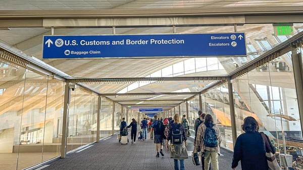 Arrivals walking towards US Customs and Border Protection at Los Angeles International Airport