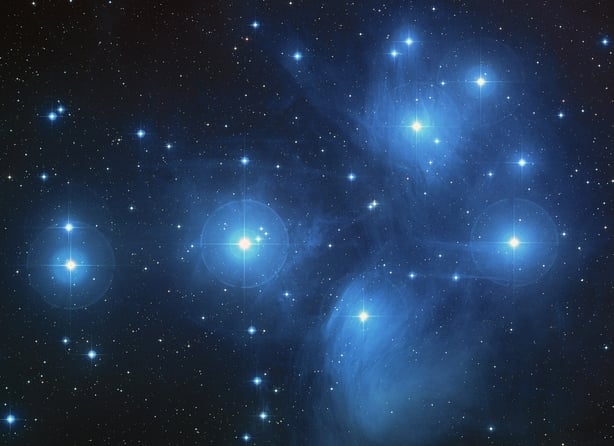 The Pleiades in all its glory - an open cluster of new start gravitational bound as they traverse the Milky Way galaxy. 