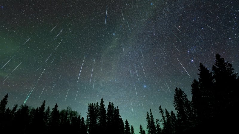 A composite photo of the Geminids created by combing 47 photos that have been oriented to match the star position and show how meteor showers originate from the same point relative to the stars. Photo: Getty Images
