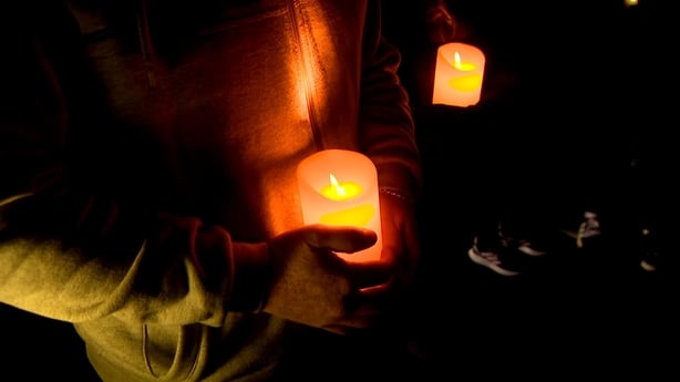 A vigil is held in Edenderry, Co Offaly for victims of the arson attack