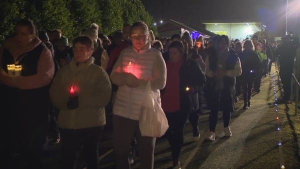 A vigil is held in Edenderry, Co Offaly for victims of the arson attack