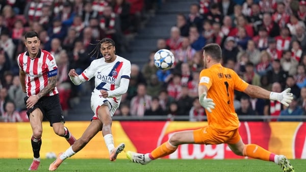 PSG's Bradley Barcola challenges Athletic Bilbao goalkeeper Unai Simon - Champions League, December 2025