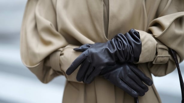 Diane Batoukina wears a camel trench coat by Destree, brown leather gloves by Massimo Dutti, during a street style fashion photo session, on October 28, 2025 in Paris, France. (Photo by Edward Berthelot/Getty Images)