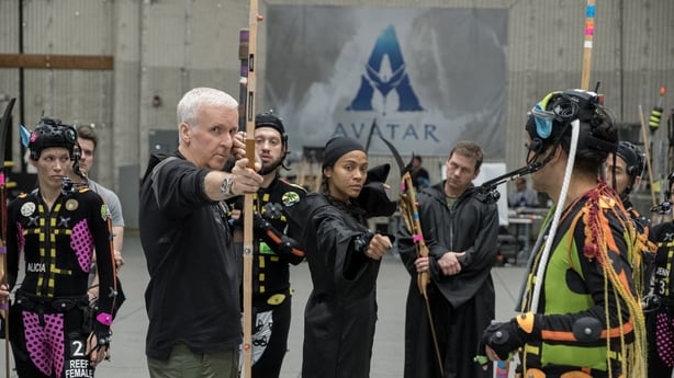 (L-R) Director James Cameron and Zoe Saldaña on the set of Avatar: Fire and Ash. Photo by Mark Fellman