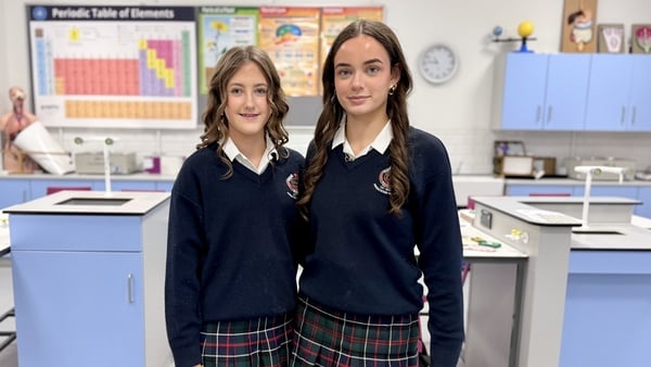 Fifth year pupils Eva Marie Whelan and Katie Hobson Shaw stand together in their school’s science lab