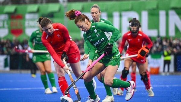 Michelle Carey of Ireland in action against Tessa Howard of England during the FIH Women's Hockey Pro League match between Ireland and England at the Sport Ireland Campus in Dublin.