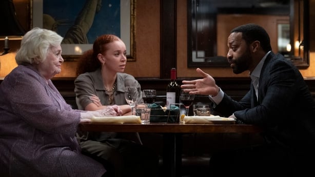 Eleanor (June Squibb), Nina (Erin Kellyman), and Roger (Chiwetel Ejiofor) have dinner in Eleanor the Great