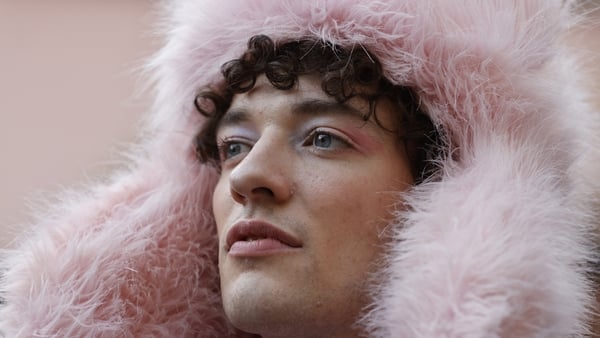 Swiss singer Nemo Mettler, also known as Nemo, winner of the 68th Eurovision Song Contest (ESC) 2024 with the song The Code, looks on during a welcome event in their hometown of Biel on 17 June, 2024