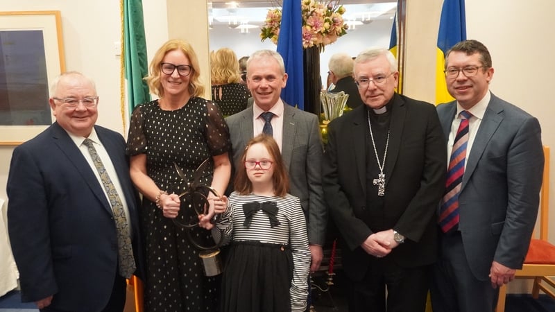 Sinéad Fidgeon and Martin McBreen received the award at Leinster House yesterday alongside their daughter Grace