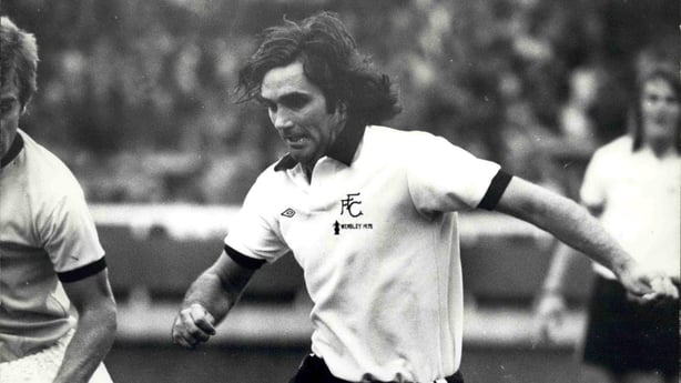 Black and white picture of George Best playing football
