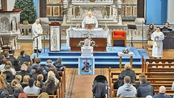 Fr Corcoran reads words from Tadhg's mother: he "filled a lifetime of love" into his four years