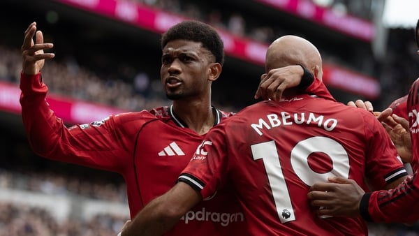 Bryan Mbeumo of Manchester United celebrates scoring Utd's first goal with Amad Diallo during the Premier League match between Tottenham Hotspur and Manchester United at Tottenham Hotspur Stadium on November 08, 2025 in London, England.