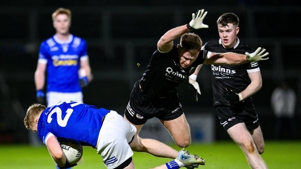 23 November 2024; Aaron Morgan of Kilcoo and Kieran Hughes of Scotstown during the AIB Ulster GAA Senior Club Football Championship semi-final match between Kilcoo and Scotstown at Box-IT Athletic Grounds in Armagh. Photo by Ramsey Cardy/Sportsfile