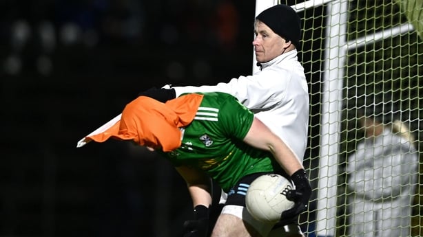 25 January 2025; Cavan goalkeeper Gary O'Rourke ducks underneath the orange flag after retrieving the ball after a two-point score during the Allianz Football League Division 2 match between Cavan and Monaghan at Kingspan Breffni in Cavan. Photo by Ben McShane/Sportsfile
