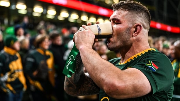22 November 2025; Malcolm Marx of South Africa drinks a Guinness after the Quilter Nations Series 2025 match between Ireland and South Africa at the Aviva Stadium in Dublin. Photo by Ramsey Cardy/Sportsfile