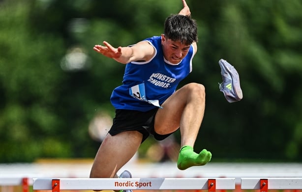 21 June 2025; Eddie Raicevic of St Augustine's, representing Munster, loses his spike whilst competing in the boys 100m hurdles during the 123.ie Irish Schools Athletics Association Tailteann Games at SETU Campus in Carlow. Photo by Sam Barnes/Sportsfile 