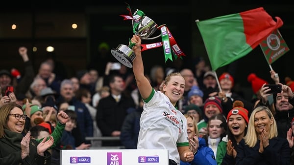 13 December 2025; Knockbride captain Sarah McCabe lifts the cup after the AIB All-Ireland Ladies Football Club Intermediate Club Championship final match between Knockbride of Cavan and Caltra Cuans of Galway at Croke Park in Dublin. Photo by Shauna Clint