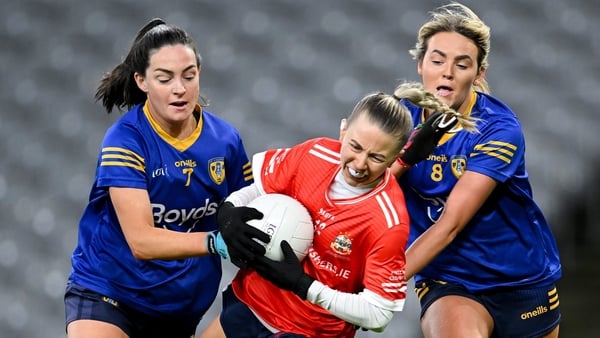 13 December 2025; Lynsey Noone of Kilkerrin-Clonberne in action against St Ergnat’s, Moneyglass players Rebecca Bradley, left, and Aoife Kelly during the AIB All-Ireland Ladies Football Club Senior Club Championship final match between Kilkerrin-Clonberne