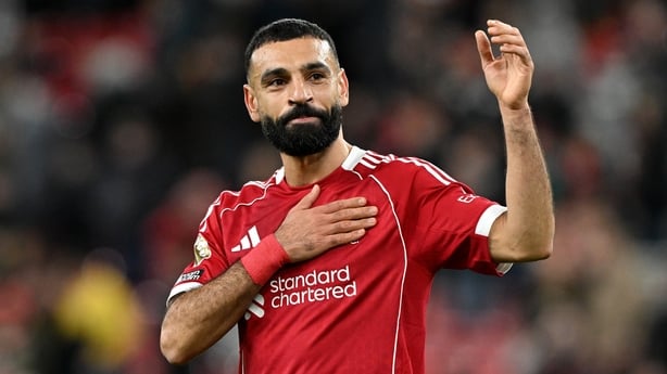 LIVERPOOL, ENGLAND - DECEMBER 13: (THE SUN OUT, THE SUN ON SUNDAY OUT) Mohamed Salah of Liverpool pats the Liverpool badge on his shirt after the Premier League match between Liverpool and Brighton & Hove Albion at Anfield on December 13, 2025 in Liverpool, England. (Photo by Liverpool FC/Liverpool 