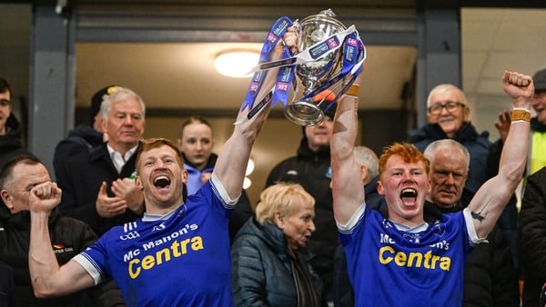 13 December 2025; Kieran Hughes, left, and Ryan O'Toole lift the trophy after the AIB Ulster GAA Football Senior Club Championship final match between Kilcoo and Scotstown at BOX-IT Athletic Grounds in Armagh. Photo by Ramsey Cardy/Sportsfile