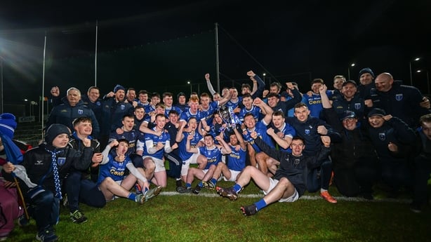 13 December 2025; The Scotstown team celebrate with the trophy after the AIB Ulster GAA Football Senior Club Championship final match between Kilcoo and Scotstown at BOX-IT Athletic Grounds in Armagh. Photo by Ramsey Cardy/Sportsfile