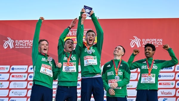 14 December 2025; The second placed Ireland team, from left, Jack O'Leary, Brian Fay, Cormac Dalton, Darragh McElhinney and Efrem Gidey on the podium with their silver medals during the 2025 SPAR European Cross Country Championships in Lagoa, Portugal. Ph