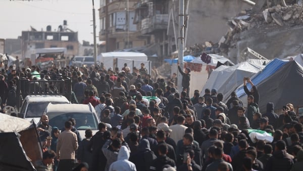 Palestinians attend the funeral ceremony of the four Palestinians, including Raid Saad, a commander of the Al-Qassam Brigades, the armed wing of Hamas, who died as a result of an Israeli airstrike