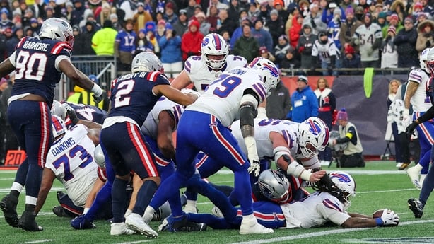 FOXBOROUGH, MA - DECEMBER 14: James Cook III #4 of the Buffalo Bills reaches for the end zone during a game between the New England Patriots and the Buffalo Bills on December 14, 2025, at Gillette Stadium in Foxborough, Massachusetts. (Photo by Fred Kfoury III/Icon Sportswire via Getty Images)