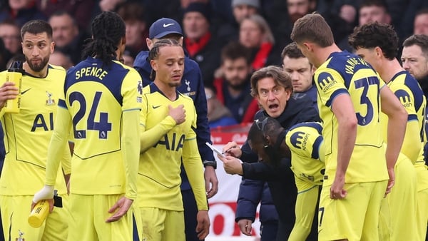 NOTTINGHAM, ENGLAND - DECEMBER 14: Thomas Frank manager / head coach of Tottenham Hotspur shows his notes as he speaks to the team during the Premier League match between Nottingham Forest and Tottenham Hotspur at City Ground on December 14, 2025 in Notti