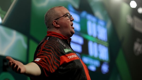 LONDON, ENGLAND - DECEMBER 14: Stephen Bunting of England walks on for his match on Day Four of the 2025/26 Paddy Power World Darts Championship at Alexandra Palace on December 14, 2025 in London, England. (Photo by Andrew Redington/Getty Images)