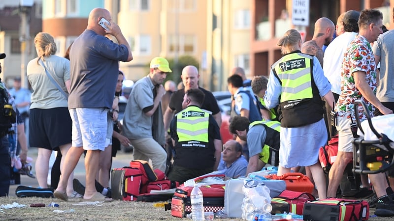 Emergency responders treat some of those wounded during the attack on Bondi Beach